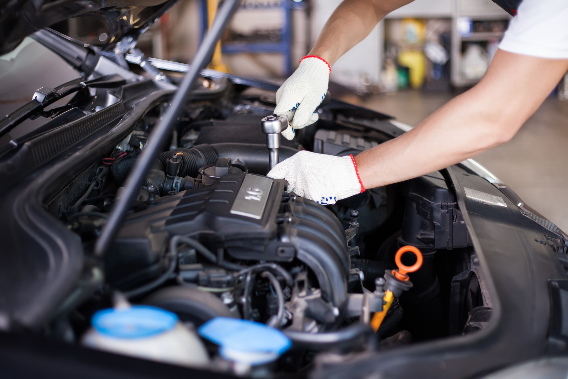 Hands of car mechanic